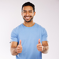 studio shot of a young man showing a thumbs up ges 2023 11 27 05 27 14 utc